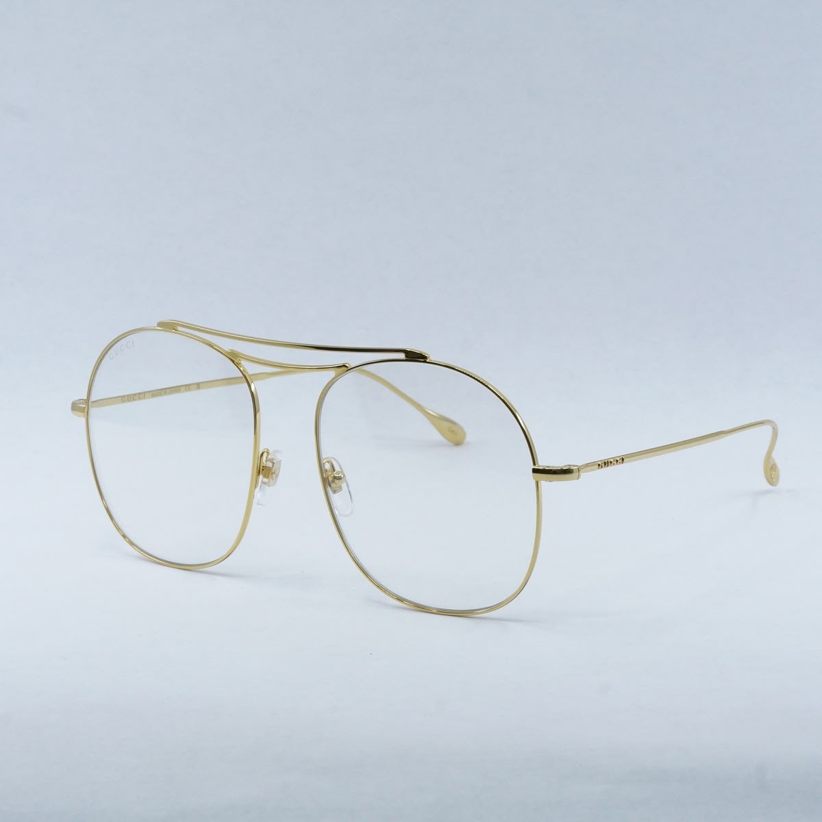 Gucci GG1479S 001 Gold Aviator-Style Metal Frames.